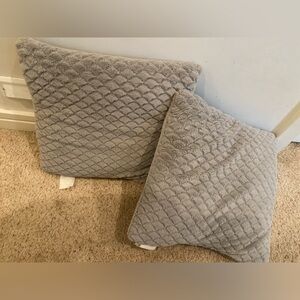 Grey patterned decorative pillows